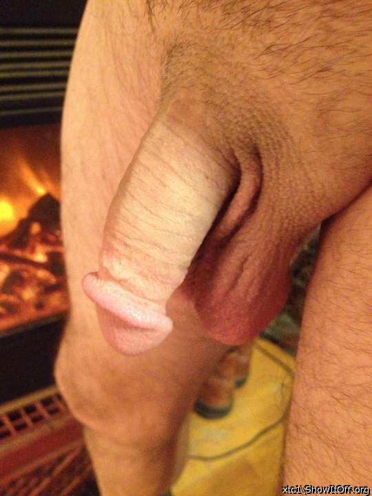 I like standing next to my fireplace naked warming my cock t