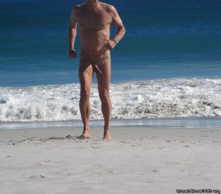 Wow Hot man runnin on the  beach  