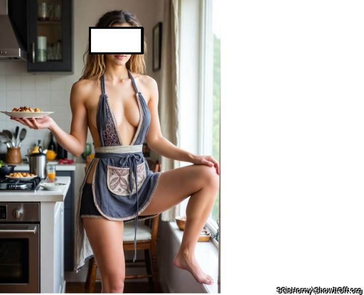 Hot lady cooking in the kitchen.