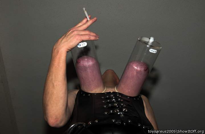 Look how purple her pumped tits look!!!