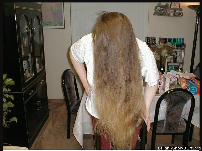 This picture of me is old. Sorry about the stuff on the table.