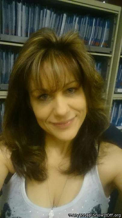 Pretty.  Very nice picture.  Nice smile.  Beautiful eyes.