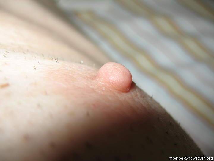 My tit-nipple as I play with my penis....