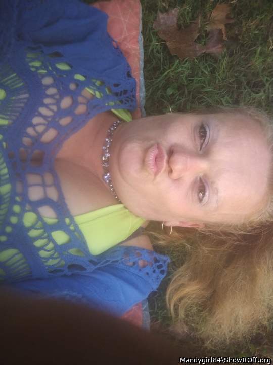 Laying. In the grass on my back