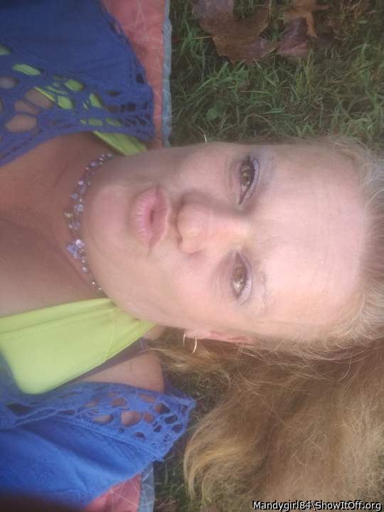 Rolling around.  In the grass taking selfies face closeup