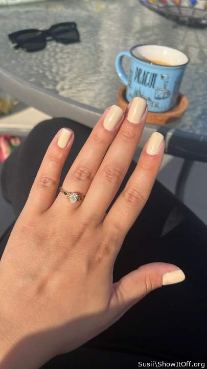 Nice hands.  New nail color?  That hand would feel terrific 