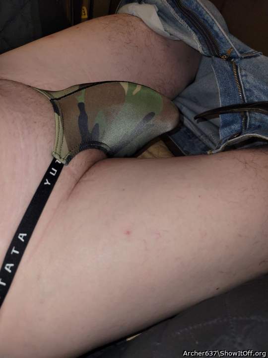 Horny wearing a camo thong
